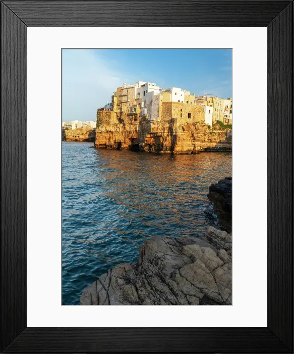 Framed Print : View of the medieval village of Polignano a Mare on top of the cliff at sunset, Bari, Apulia, Adriatic Sea, Mediterranean Sea, Italy, Europe Framed Print : View of the medieval village of Polignano a Mare on top of the cliff at sunset, Bari, Apulia, Adriatic Sea, Mediterranean Sea, Italy, Europe