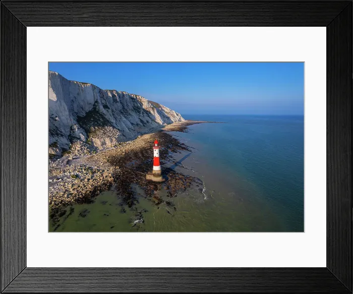 Framed Print : Aerial view of the Beachy Head Lighthouse at low tide, Seven Sisters chalk cliffs, South Downs National Park, East Sussex, England, United Kingdom Framed Print : Aerial view of the Beachy Head Lighthouse at low tide, Seven Sisters chalk cliffs, South Downs National Park, East Sussex, England, United Kingdom