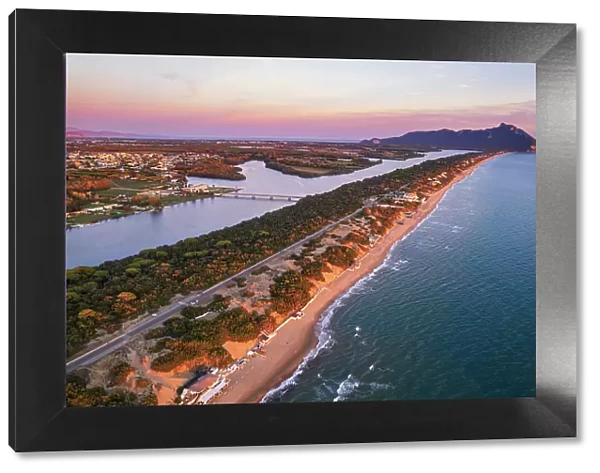 Aerial view of the lake and beach of Sabaudia with the woody mountain of Circeo in the background at dusk, Sabaudia, Tyrrhenian Sea, Latina province, Latium (Lazio), Italy, Europe