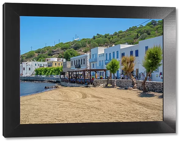 View of small beach and shops in the town of Mandraki, Mandraki, Nisyros, Dodecanese, Greek Islands, Greece, Europe