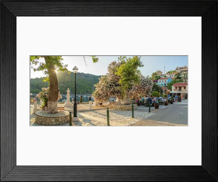 Framed Print : View of harbourside restaurant and colourful houses in Assos in golden hour, Assos, Kefalonia, Ionian Islands, Greek Islands, Greece, Europe