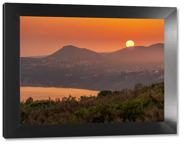 View of coastline near Lourdata at sunset, Kefalonia, Ionian Islands, Greek Islands, Greece, Europe