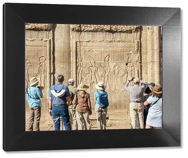 Tourists at the Temple of Hathor, which began construction in 54 BCE, part of the Dendera Temple complex, Dendera, Egypt, North Africa, Africa