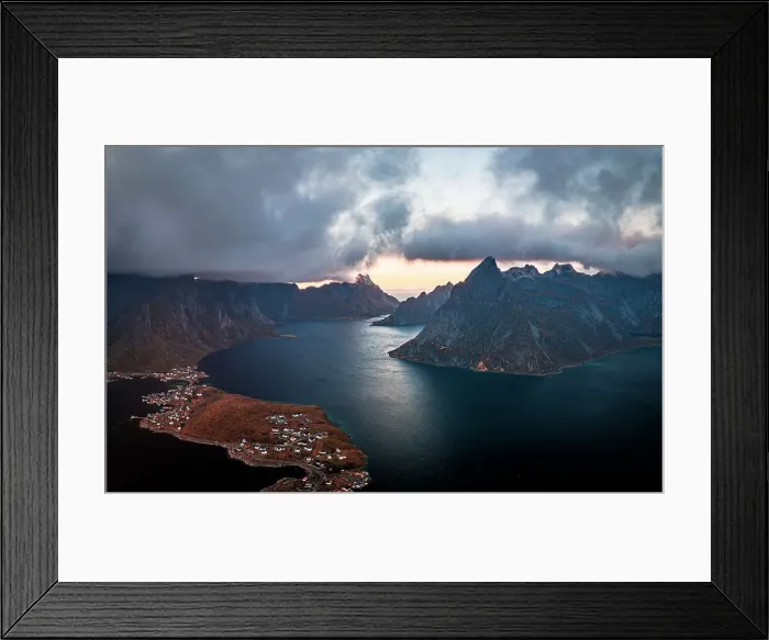 Framed Print : Storm clouds at sunset over majestic mountains along a fjord, aerial view, Reine Bay, Lofoten Islands, Nordland, Norway, Scandinavia, Europe Framed Print : Storm clouds at sunset over majestic mountains along a fjord, aerial view, Reine Bay, Lofoten Islands, Nordland, Norway, Scandinavia, Europe