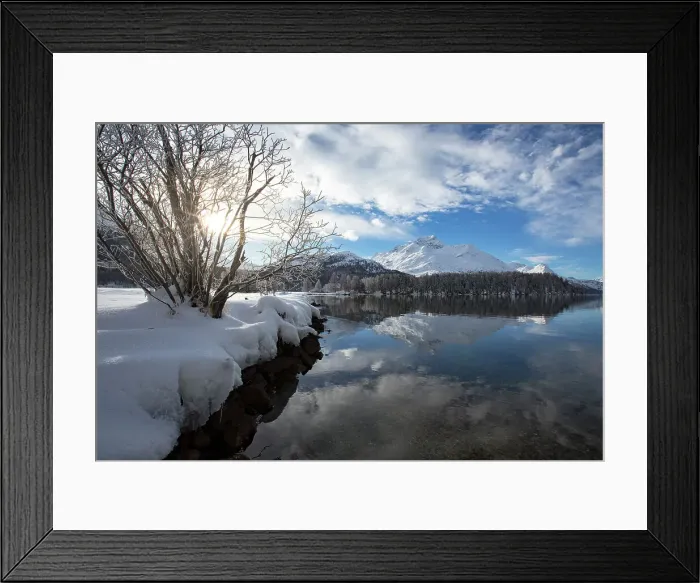 Framed Print : Snowcapped mountains reflected in the icy Lake Sils during a cold winter, Engadine, Canton of Graubunden, Switzerland, Europe Framed Print : Snowcapped mountains reflected in the icy Lake Sils during a cold winter, Engadine, Canton of Graubunden, Switzerland, Europe