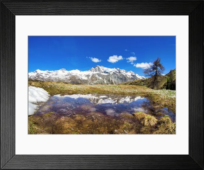 Framed Print : Snowcapped mountains reflected in a pristine lake in springtime, Fedoz valley, Bregaglia, Engadine, Canton of Graubunden, Switzerland, Europe