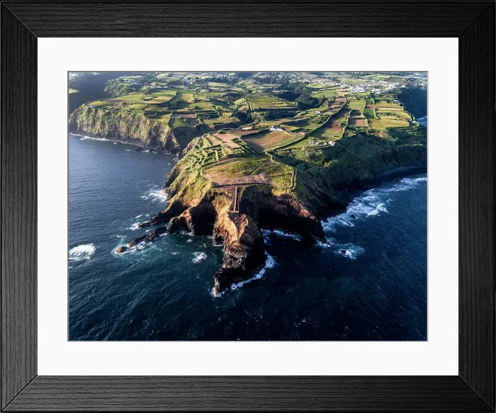 Framed Print : Aerial view of the coasts and cliffs of the island of Sao Miguel over the lighthouse of Farolim dos Fenais da Ajuda, Azores Islands, Portugal, Atlantic, Europe