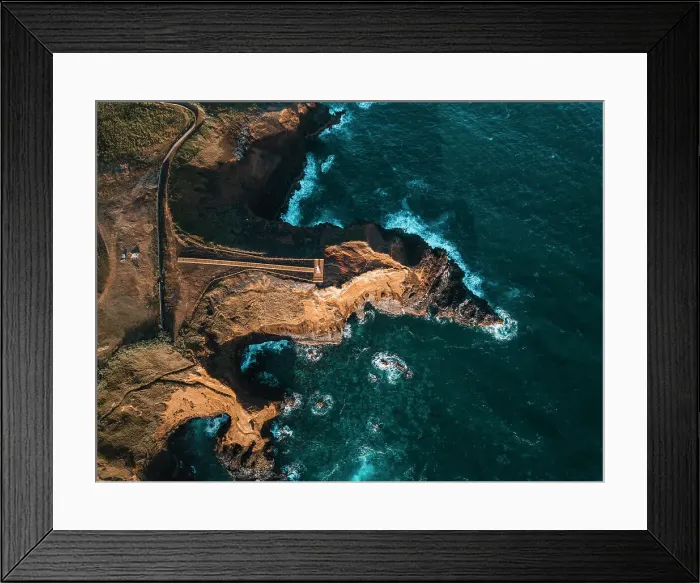 Framed Print : Aerial view of the coasts and cliffs of the island of Sao Miguel over the lighthouse of Farolim dos Fenais da Ajuda, Azores Islands, Portugal, Atlantic, Europe Framed Print : Aerial view of the coasts and cliffs of the island of Sao Miguel over the lighthouse of Farolim dos Fenais da Ajuda, Azores Islands, Portugal, Atlantic, Europe