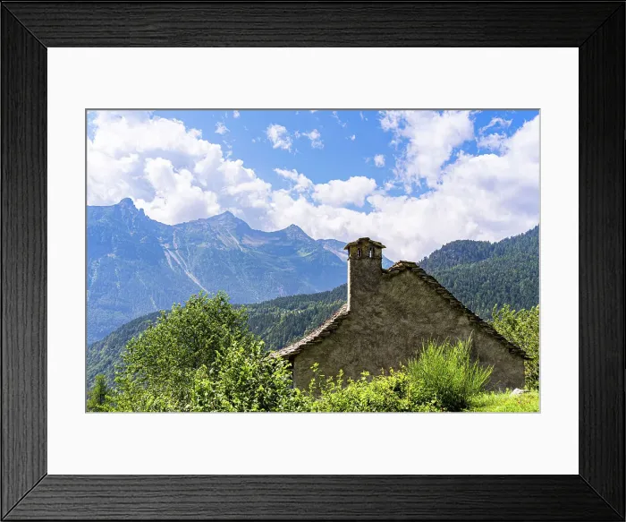 Framed Print : A traditional rural architecture style house built of rocks from the mountain in a beautiful alpine valley in summer, Piemonte (Piedmont), Northern Italy, Europe Framed Print : A traditional rural architecture style house built of rocks from the mountain in a beautiful alpine valley in summer, Piemonte (Piedmont), Northern Italy, Europe