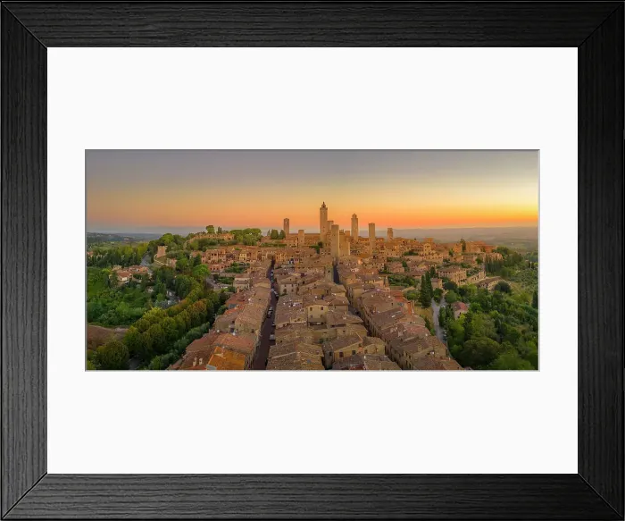 Framed Print : Elevated view of rooftops and town at sunrise, San Gimignano, Tuscany, Italy, Europe Framed Print : Elevated view of rooftops and town at sunrise, San Gimignano, Tuscany, Italy, Europe