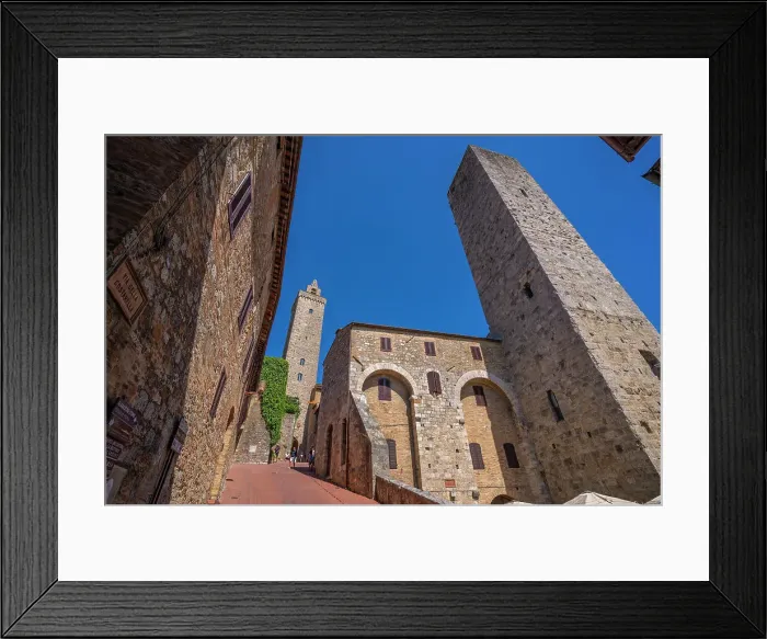 Framed Print : View of towers from street level in San Gimignano, San Gimignano, UNESCO World Heritage Site, Province of Siena, Tuscany, Italy, Europe Framed Print : View of towers from street level in San Gimignano, San Gimignano, UNESCO World Heritage Site, Province of Siena, Tuscany, Italy, Europe