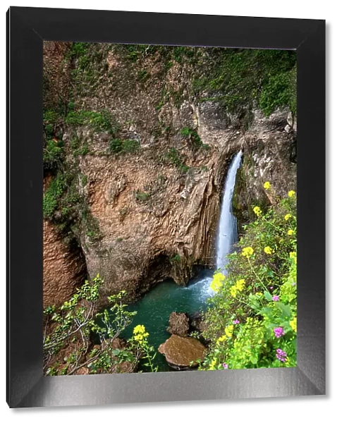 Waterfall near historic bridge of Ronda in Pueblos Blancos region, Andalusia, Spain, Europe