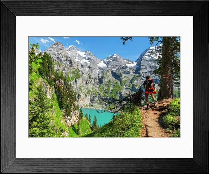 Framed Print : Rear view of a hiker standing on the trail in the wood surrounding Oeschinensee lake, Oeschinensee, Kandersteg, Bern Canton, Switzerland, Europe Framed Print : Rear view of a hiker standing on the trail in the wood surrounding Oeschinensee lake, Oeschinensee, Kandersteg, Bern Canton, Switzerland, Europe
