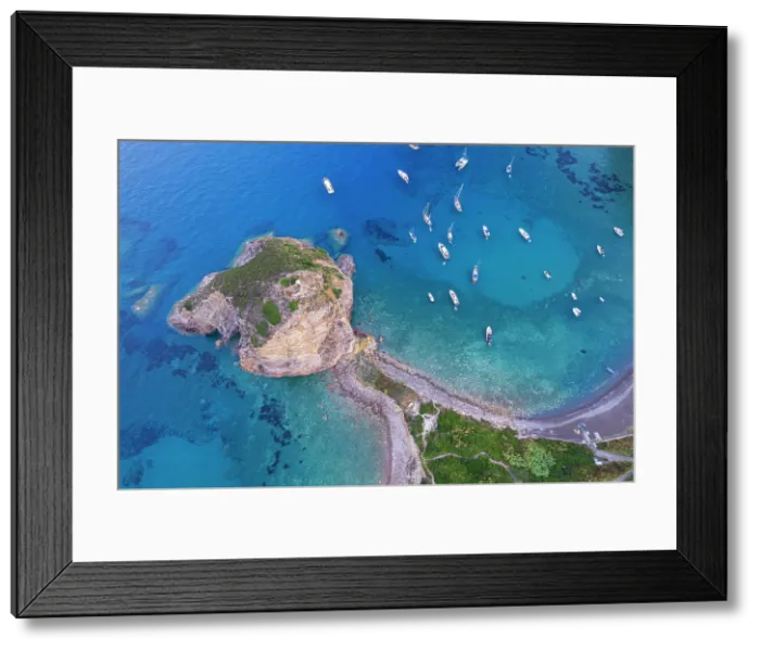 Framed Print : Aerial view of the cliff of Saint Silverio with boats anchored in Francese Bay, Palmarola island, Ponza municipality, Tyrrhenian Sea, Pontine archipelago, Latina Province, Latium (Lazio), Italy, Europe Framed Print : Aerial view of the cliff of Saint Silverio with boats anchored in Francese Bay, Palmarola island, Ponza municipality, Tyrrhenian Sea, Pontine archipelago, Latina Province, Latium (Lazio), Italy, Europe