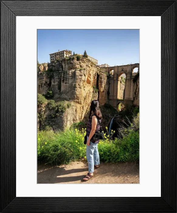 Framed Print : Woman looking at historic bridge of Ronda, Pueblos Blancos, Andalusia, Spain, Europe Framed Print : Woman looking at historic bridge of Ronda, Pueblos Blancos, Andalusia, Spain, Europe