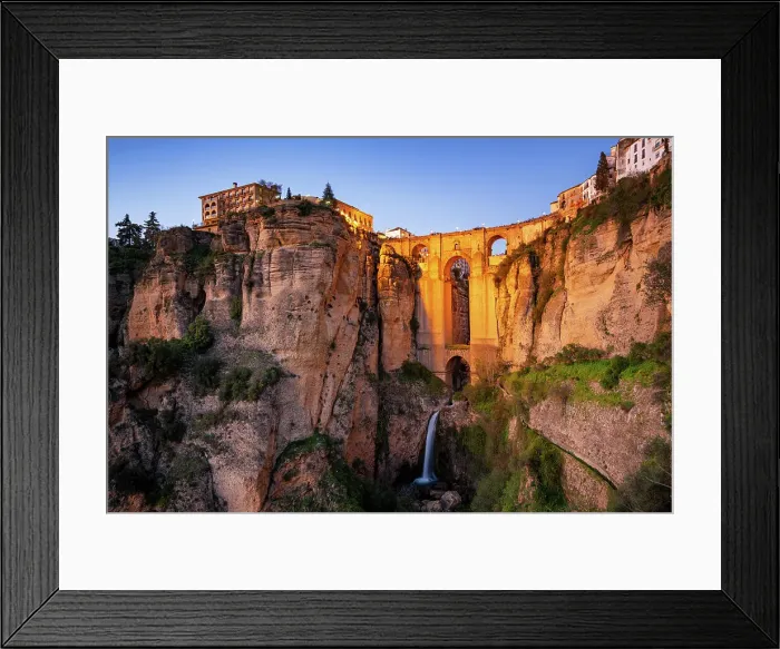 Framed Print : Ronda view with beautiful bridge and waterfall and traditional white village of Pueblos Blancos region, Andalusia, Spain, Europe Framed Print : Ronda view with beautiful bridge and waterfall and traditional white village of Pueblos Blancos region, Andalusia, Spain, Europe
