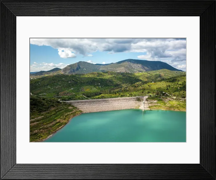 Framed Print : Drone aerial view of Zahara de la Sierra water reservoir dam with turquoise water and mountains in the background, Andalusia, Spain, Europe