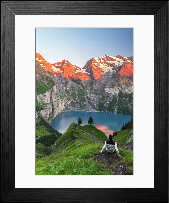 Framed Print : View of a hiker resting in front of the Oeschinensee lake surrounded by snowy peak at sunset, Oeschinensee, Kandersteg, Bern Canton, Switzerland, Europe Framed Print : View of a hiker resting in front of the Oeschinensee lake surrounded by snowy peak at sunset, Oeschinensee, Kandersteg, Bern Canton, Switzerland, Europe