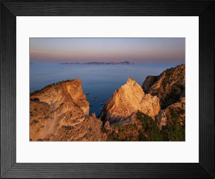 Framed Print : Aerial view of sharp cliffs of Palmarola island at sunset with the island of Ponza in the background, Ponza island, Tyrrhenian Sea, Pontine islands, Latina Province, Latium (Lazio), Italy, Europe Framed Print : Aerial view of sharp cliffs of Palmarola island at sunset with the island of Ponza in the background, Ponza island, Tyrrhenian Sea, Pontine islands, Latina Province, Latium (Lazio), Italy, Europe