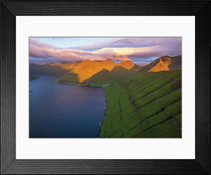 Framed Print : Aerial shot of the dramatic view of Funningur with pink sky at dawn, Eysturoy island, Faroe islands, Denmark, Europe Framed Print : Aerial shot of the dramatic view of Funningur with pink sky at dawn, Eysturoy island, Faroe islands, Denmark, Europe