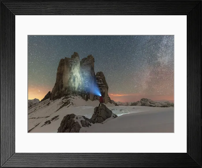 Framed Print : Hiker with head torch views the Tre Cime di Lavaredo on a starry night with the Milky Way, winter view, Tre Cime di Lavaredo (Lavaredo peaks), Sesto (Sexten), Dolomites, South Tyrol, Italy, Europe