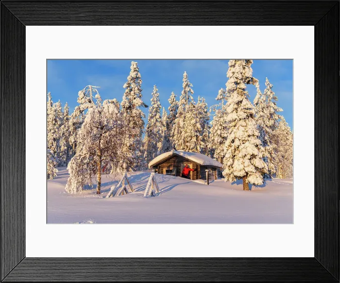 Framed Print : Tourist in the early morning sun stands in front of an isolated chalet in the snowy forest, Norrbotten, Swedish Lapland, Sweden, Scandinavia, Europe Framed Print : Tourist in the early morning sun stands in front of an isolated chalet in the snowy forest, Norrbotten, Swedish Lapland, Sweden, Scandinavia, Europe