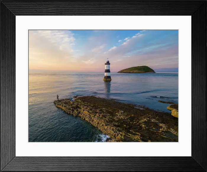 Framed Print : Fisherman at Trwyn Du Lighthouse at sunset in summer, Beaumaris, Wales, Great Britain, United Kingdom, Europe Framed Print : Fisherman at Trwyn Du Lighthouse at sunset in summer, Beaumaris, Wales, Great Britain, United Kingdom, Europe