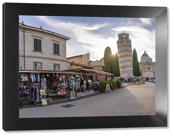 View of souvenir stalls and Leaning Tower of Pisa at sunset, UNESCO World Heritage Site, Pisa, Province of Pisa, Tuscany, Italy, Europe