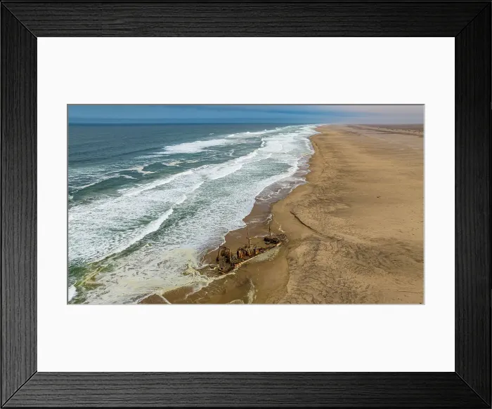 Framed Print : Aerial of a shipwreck on a beach in the Iona National Park, Namibe, Angola, Africa Framed Print : Aerial of a shipwreck on a beach in the Iona National Park, Namibe, Angola, Africa