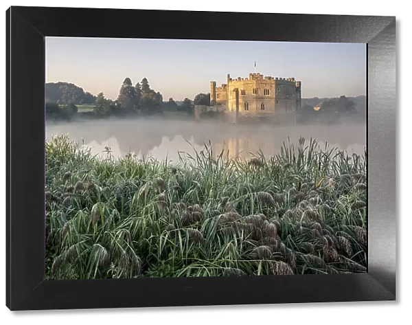 Leeds Castle in morning mist, near Maidstone, Kent, England, United Kingdom, Europe