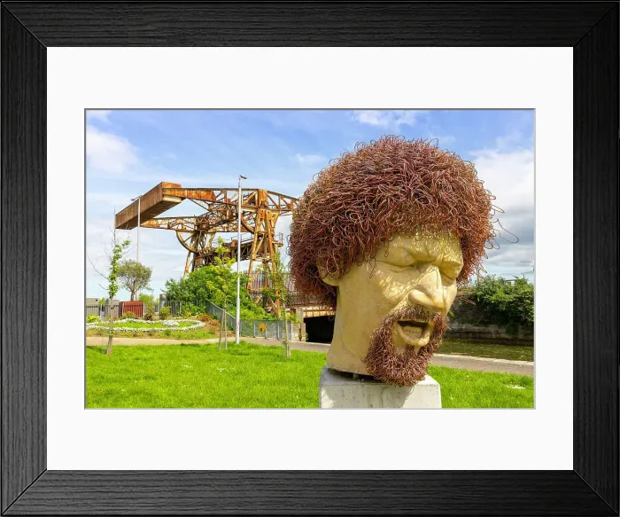 Framed Print : Statue of Luke Kelly, Sheriff Street Lifting Bridge in background, Linear Park, Dublin, Republic of Ireland, Europe Framed Print : Statue of Luke Kelly, Sheriff Street Lifting Bridge in background, Linear Park, Dublin, Republic of Ireland, Europe