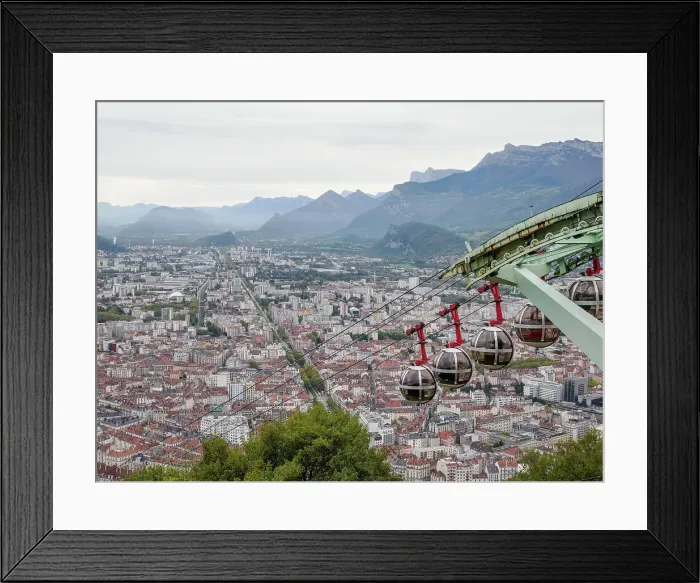 Framed Print : View from the Bastille hill over Grenoble with mountains in the background and cable car in the foreground, Grenoble, Auvergne-Rhone-Alpes, France, Europe Framed Print : View from the Bastille hill over Grenoble with mountains in the background and cable car in the foreground, Grenoble, Auvergne-Rhone-Alpes, France, Europe