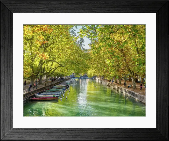 Framed Print : Parks and boats line the mouth of the Thiou River at Lake Annecy, Annecy, Haute-Savoie, France, Europe