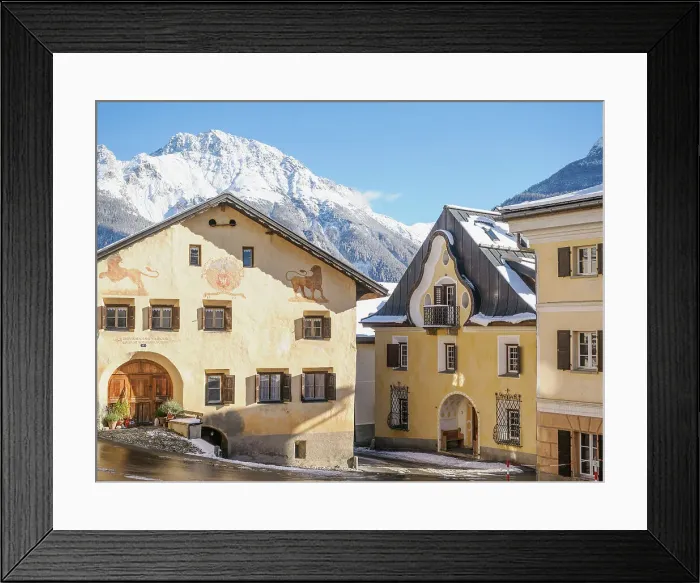 Framed Print : A plaza in the Alpine village of Sent in winter, Graubunden, Switzerland, Europe Framed Print : A plaza in the Alpine village of Sent in winter, Graubunden, Switzerland, Europe