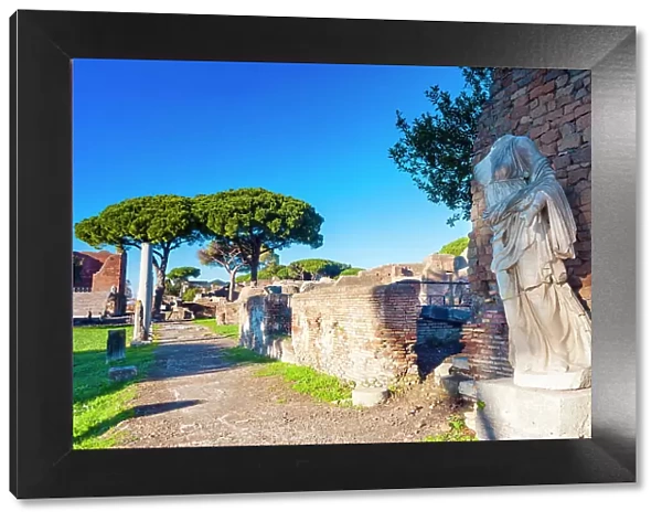 The statue of Victory on the rear of the Temple of Rome and Augustus, Ostia Antica archaeological site, Ostia, Rome province, Latium (Lazio), Italy, Europe