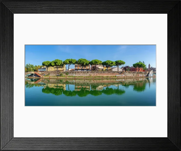 Framed Print : View of buildings and pine trees reflecting on the Rimini Canal, Rimini, Emilia-Romagna, Italy, Europe Framed Print : View of buildings and pine trees reflecting on the Rimini Canal, Rimini, Emilia-Romagna, Italy, Europe