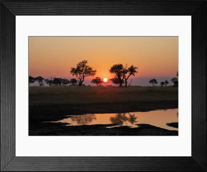 Framed Print : Sunset over the Okavango Delta, Botswana, Africa Framed Print : Sunset over the Okavango Delta, Botswana, Africa