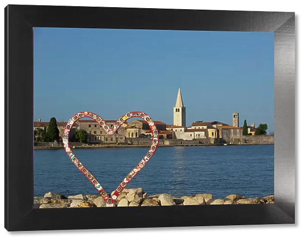 Love Symbol, Red Heart, Tower of Euphrasian Bascilica in the background, Old Town, Porec, Croatia, Europe