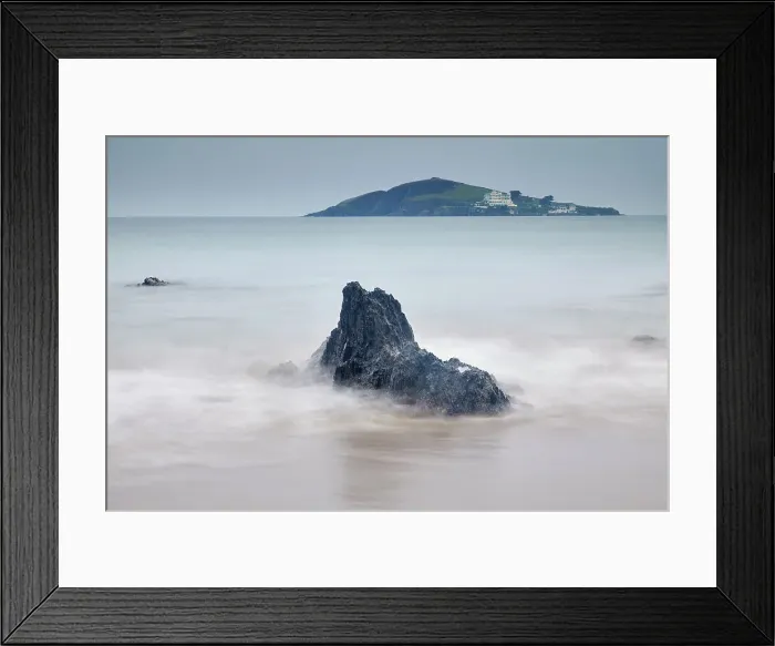 Framed Print : A dusk view of shoreline rocks on the beach at Bantham, with a view towards Burgh Island and its hotel, on the south coast of Devon, England, United Kingdom, Europe Framed Print : A dusk view of shoreline rocks on the beach at Bantham, with a view towards Burgh Island and its hotel, on the south coast of Devon, England, United Kingdom, Europe