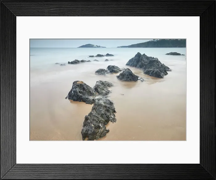Framed Print : Shoreline boulders buried in sand face an advancing tide at dusk, looking from Bantham beach towards Burgh Island, on the south coast of Devon, England, United Kingdom, Europe Framed Print : Shoreline boulders buried in sand face an advancing tide at dusk, looking from Bantham beach towards Burgh Island, on the south coast of Devon, England, United Kingdom, Europe