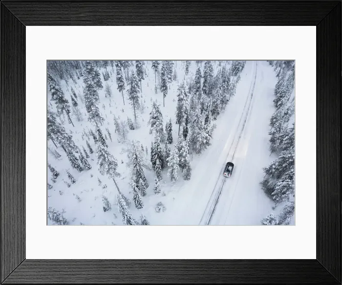 Framed Print : Aerial view of a car driving through the snow covered forest on icy road, Akaslompolo, Finnish Lapland, Finland, Scandinavia, Europe Framed Print : Aerial view of a car driving through the snow covered forest on icy road, Akaslompolo, Finnish Lapland, Finland, Scandinavia, Europe