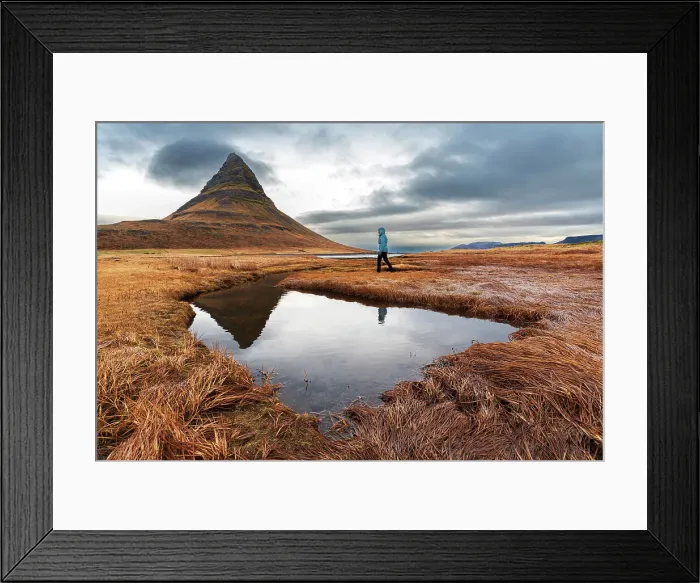 Framed Print : Woman walks in front of the famous Kirkjufell mountain reflecting in the water of a small lake, Snaefellsnes Peninsula, Western Iceland, Iceland, Polar Regions Framed Print : Woman walks in front of the famous Kirkjufell mountain reflecting in the water of a small lake, Snaefellsnes Peninsula, Western Iceland, Iceland, Polar Regions