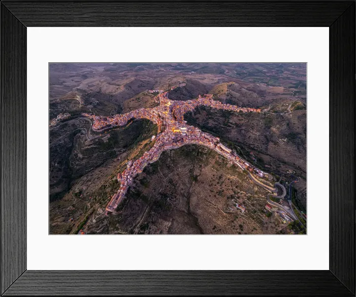 Framed Print : Aerial view of Centuripe, the human-shaped or star-shaped town, seen from above at dusk, Centuripe, Enna province, Sicily, Italy, Mediterranean, Europe Framed Print : Aerial view of Centuripe, the human-shaped or star-shaped town, seen from above at dusk, Centuripe, Enna province, Sicily, Italy, Mediterranean, Europe
