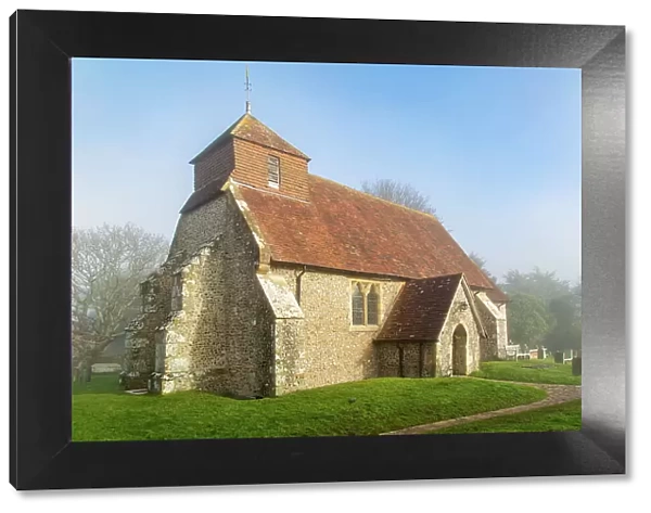 The 11th century Church of St. Mary The Virgin on a foggy winter morning, Friston, South Downs National Park, East Sussex, England, United Kingdom, Europe