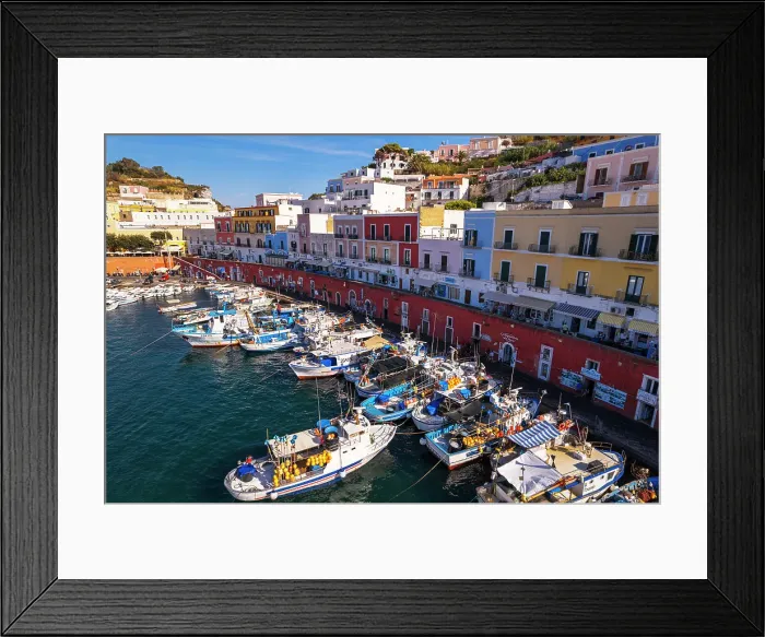 Framed Print : Aerial view of the colorful Italian village of Ponza with fishing vessels in the foreground, Pontine Islands, Latina province, Tyrrhenian Sea, Latium (Lazio), Italy, Europe