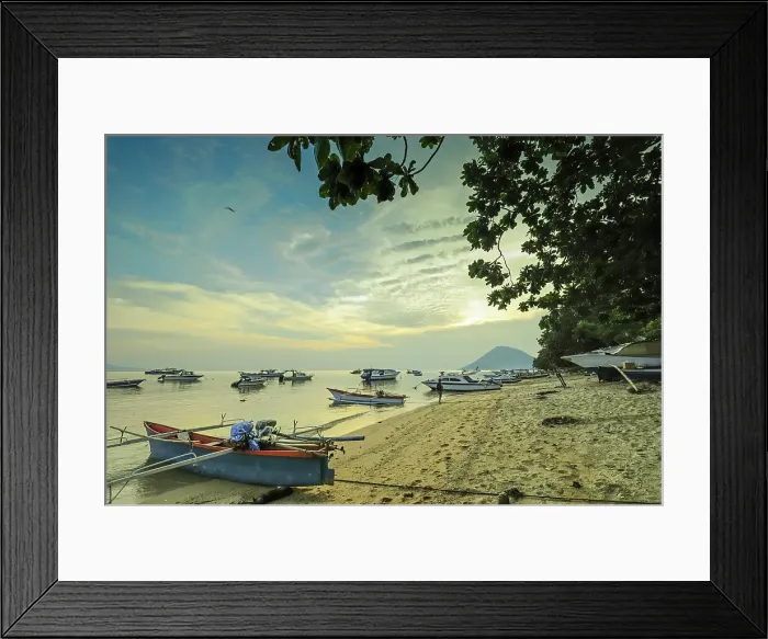 Framed Print : Boats off the town beach at sunset with Manadotua Island beyond on this holiday dive island, Bunaken, North Sulawesi, Indonesia, Southeast Asia, Asia Framed Print : Boats off the town beach at sunset with Manadotua Island beyond on this holiday dive island, Bunaken, North Sulawesi, Indonesia, Southeast Asia, Asia