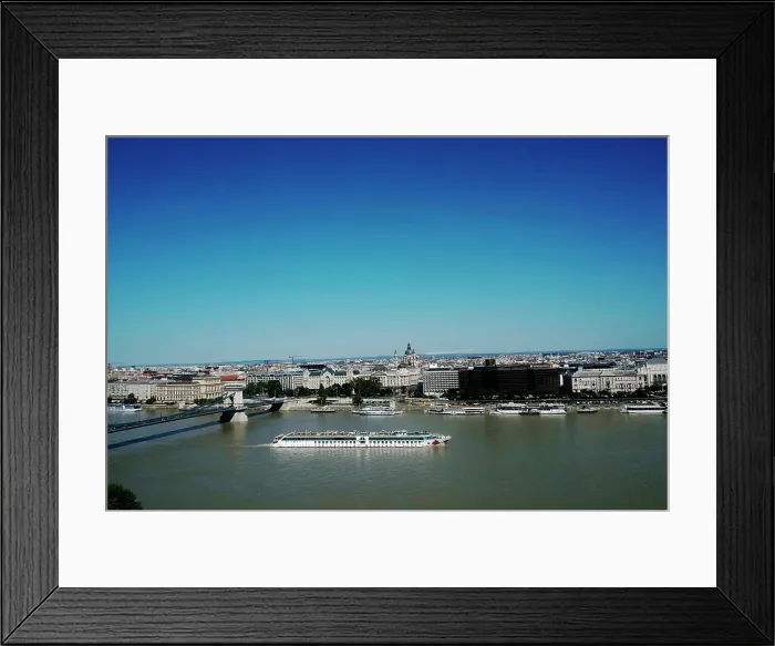 Framed Print : View of sightseeing boat on the River Danube and Budapest, Hungary, Europe Framed Print : View of sightseeing boat on the River Danube and Budapest, Hungary, Europe