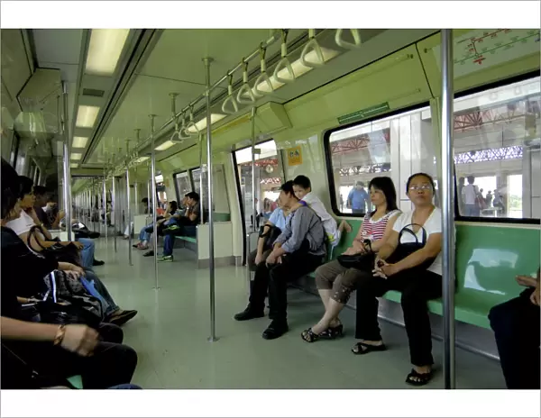 Passengers on a mass rapid transit train in Singapore, Southeast Asia, Asia