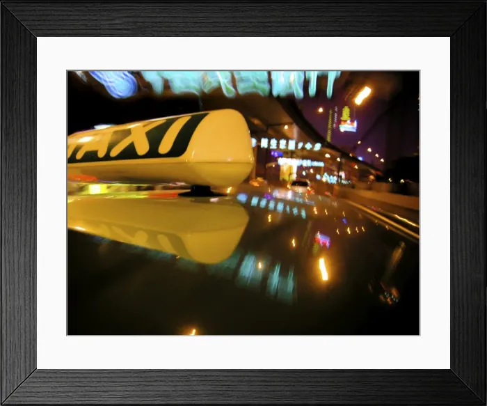 Framed Print : Close up of Taxi sign on car roof with neon road signs, Shanghai, China, Asia Framed Print : Close up of Taxi sign on car roof with neon road signs, Shanghai, China, Asia