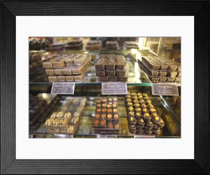 Framed Print : Chocolates in a shop window, France, Europe Framed Print : Chocolates in a shop window, France, Europe